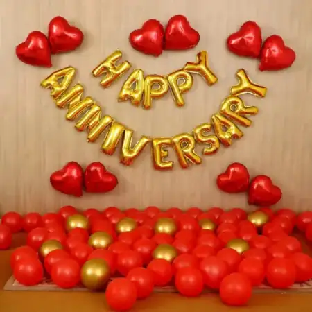 Golden theme anniversary balloon ring setup with neon sign, Gurugram