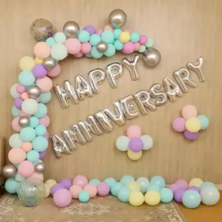 Terrace anniversary party balloon arch and fairy light canopy, Gurugram