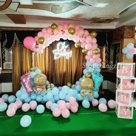 Gender neutral sage green baby shower balloon setup, Gurugram