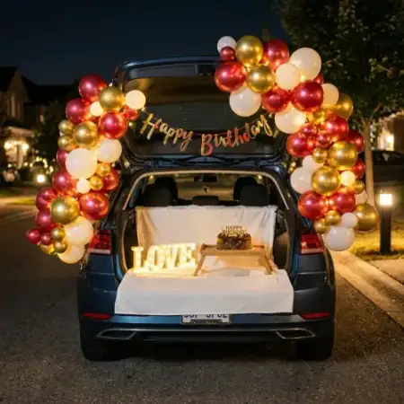 Car boot celebration setup with fairy lights and balloons, Gurugram