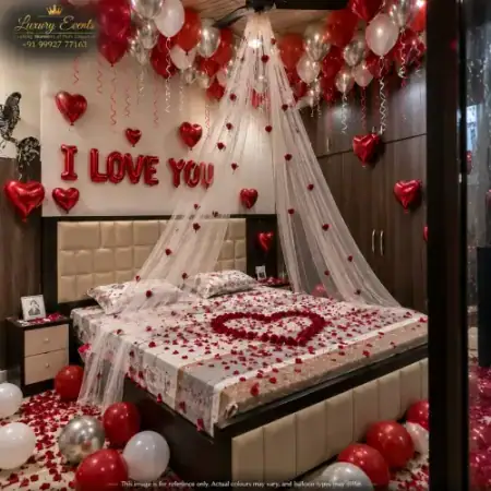 Red and gold romantic anniversary hotel room decoration in DLF Phase 2 Gurugram by Luxury Events