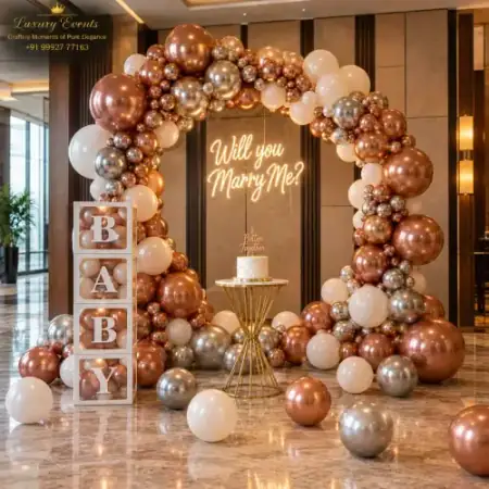 Marry Me setup in DLF Phase 2 Gurugram with rose gold and silver ring balloon arch and glowing neon sign