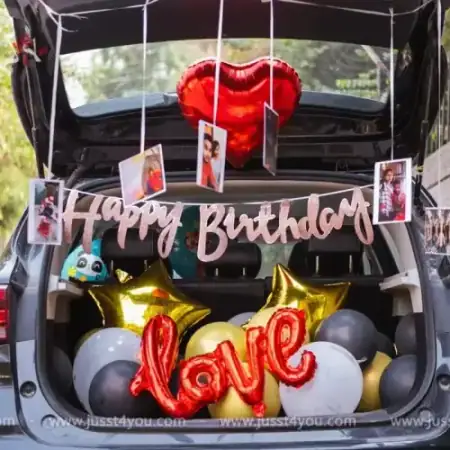 Car boot surprise setup with rose petals, Gurugram