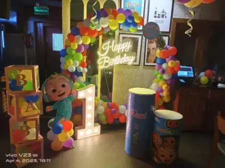 Cocomelon theme first birthday decoration with number light, Gurugram